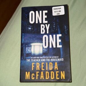 One by One by Freida McFadden - Blue & Yellow Paperback Thriller
